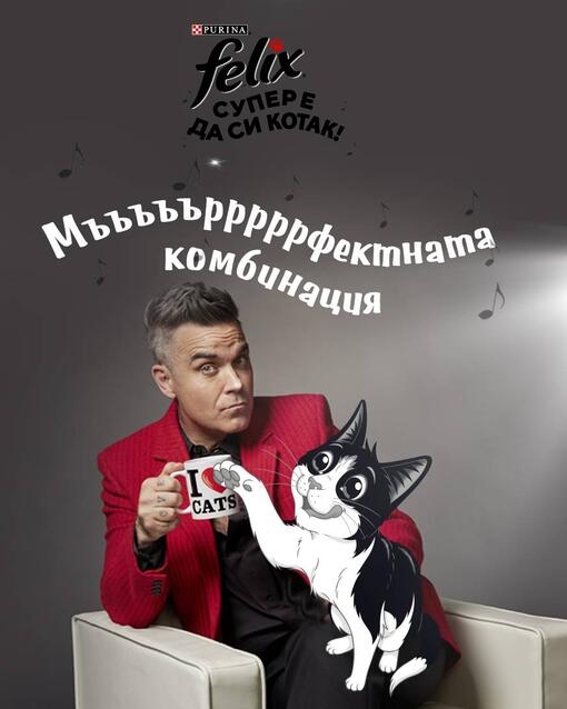Феликс и Роби заедно, Роби държи чаша с надпис „Обичам котки“.